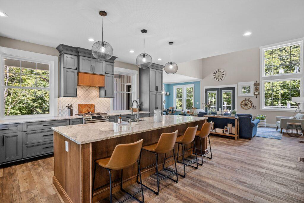 Modern kitchen with large island, premium appliances, and open-concept layout.